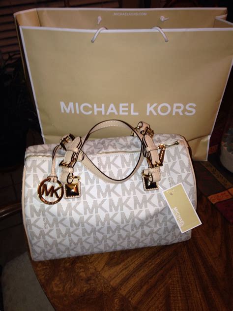 where can i buy real michael kors bags for heap|cheap authentic michael kors bags.